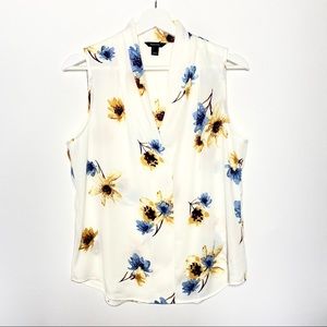 Sleeveless printed blouse.